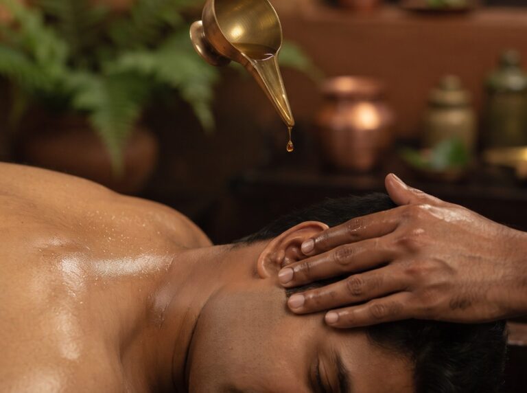 Warm medicated oil dropped from a brass vessel towards the ear during Karna Purana